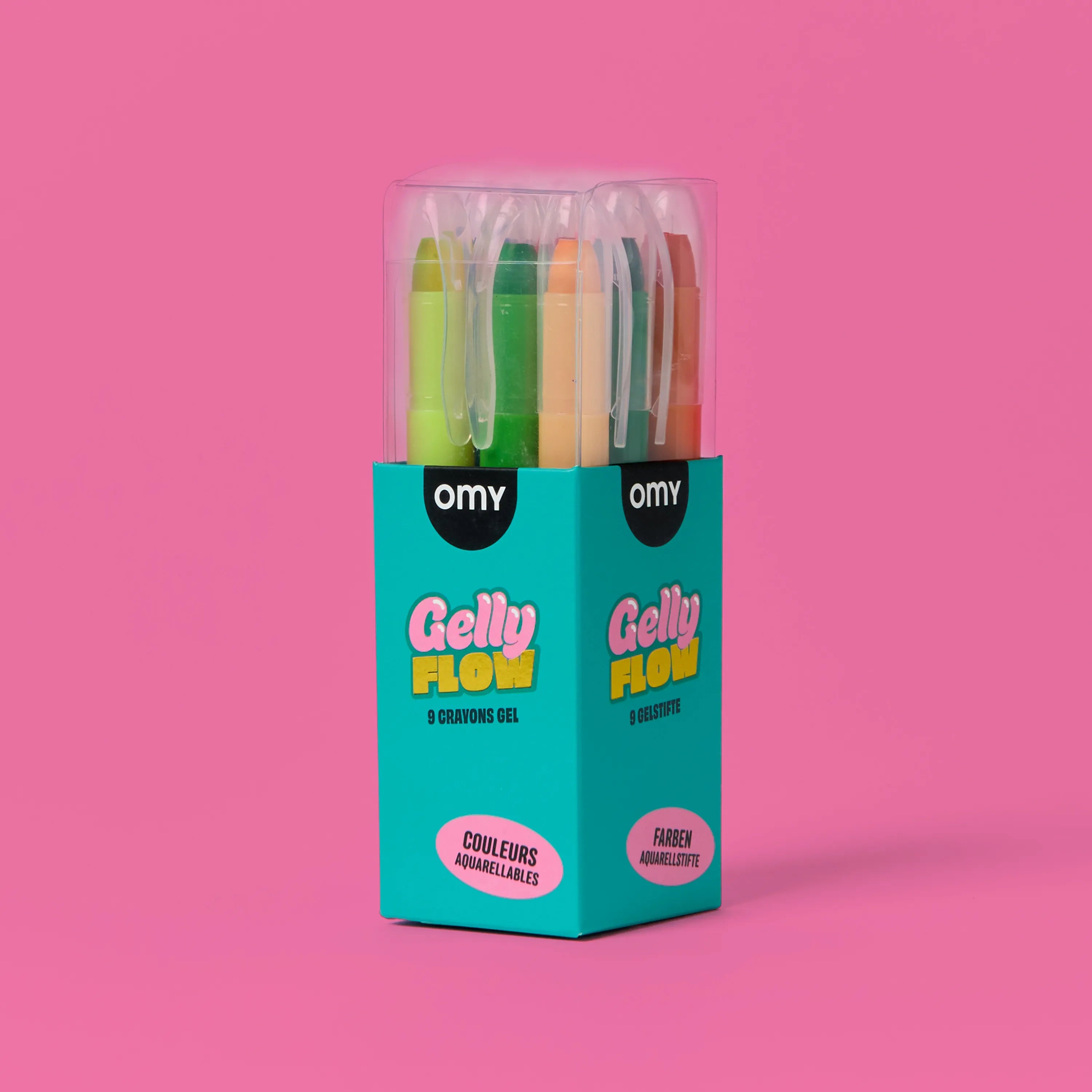 Crayons gel OMY présentés dans leur emballage rose et turquoise.