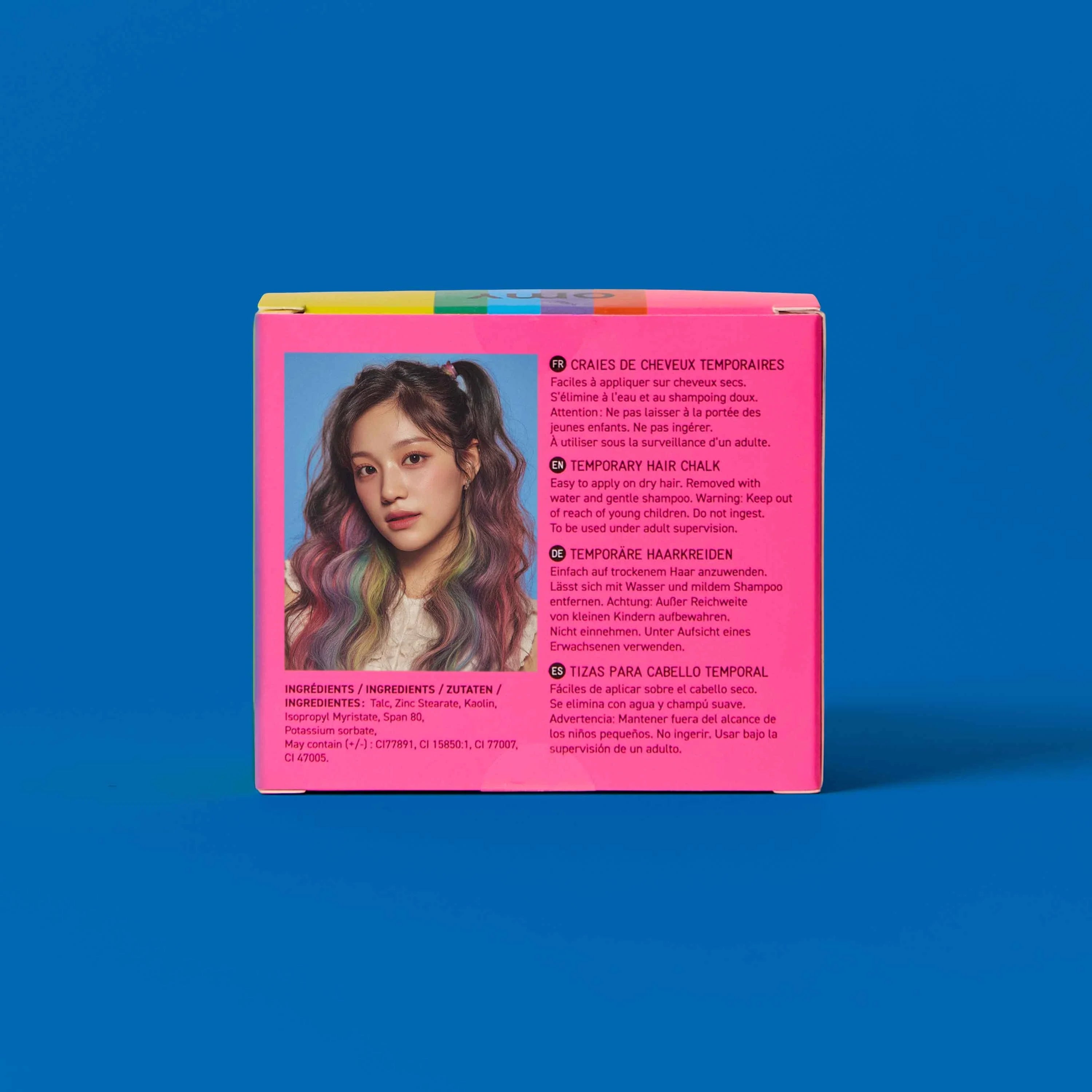 Dos de la boîte Hair Color OMY arc-en-ciel : photo de cheveux multicolores et mode d'emploi des craies temporaires