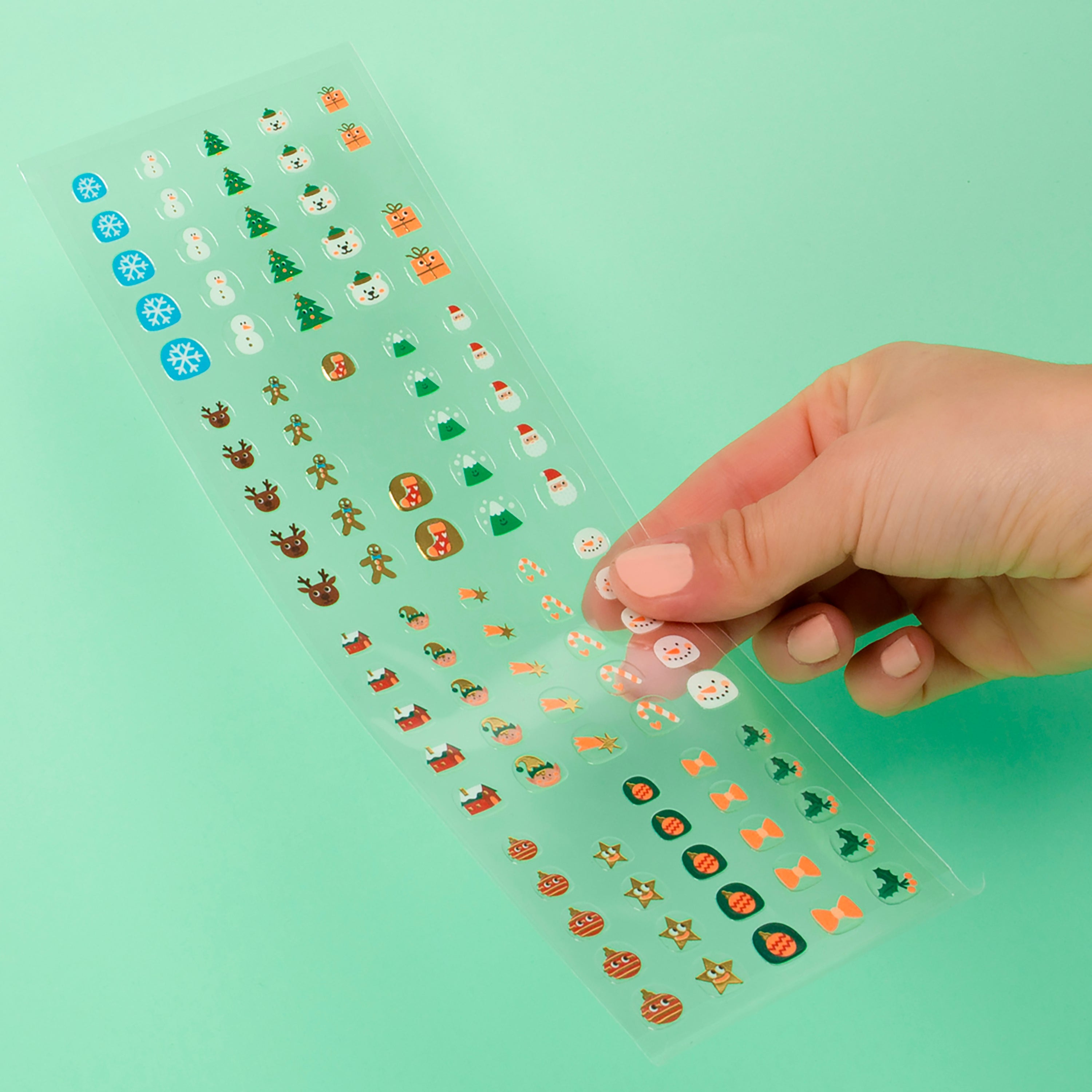 Planche Nail Stickers OMY HO HO HO – Stickers dorés et colorés pour ongles enfants