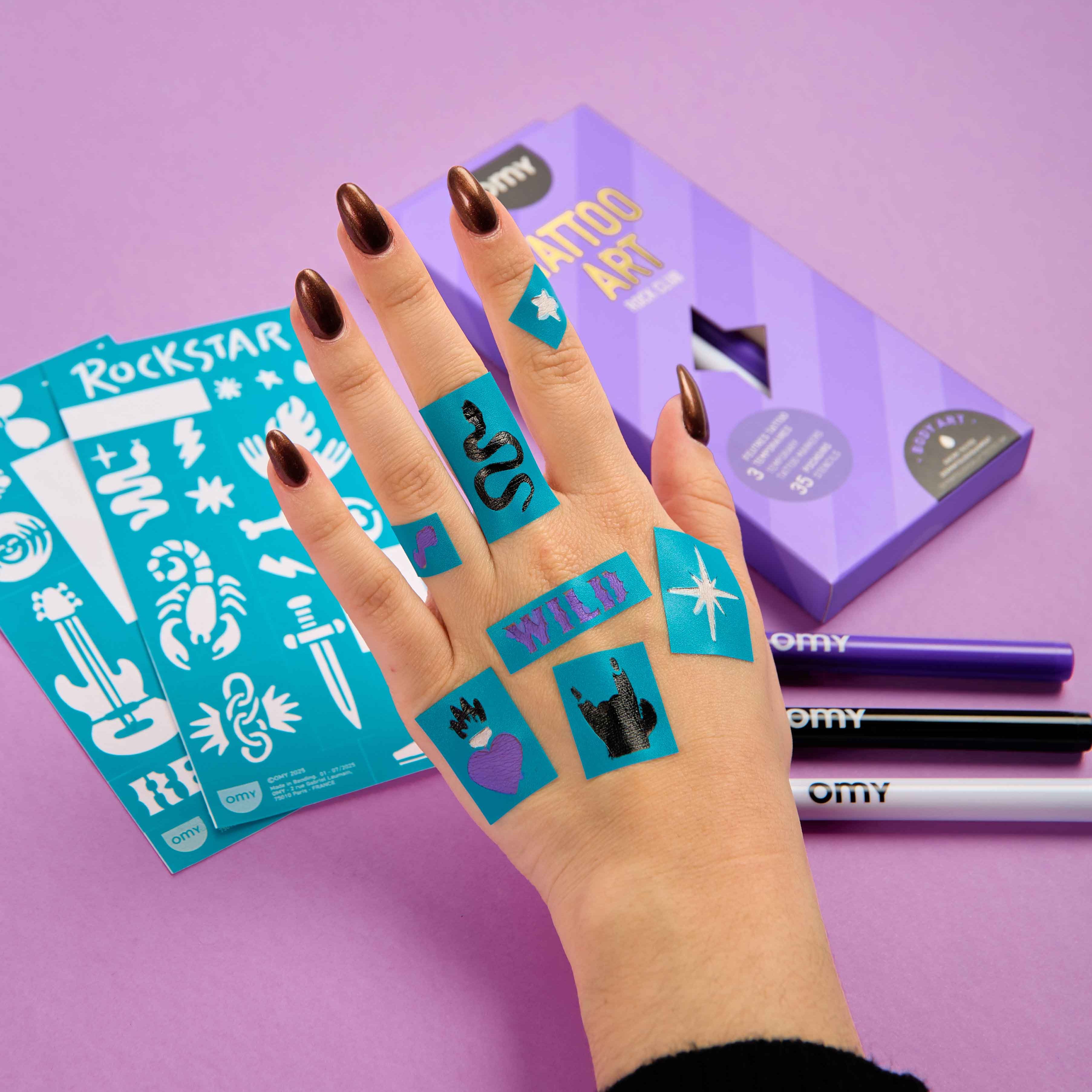 Feutres Tattoo Art Rock Club OMY avec pochoirs – tatouages temporaires rock sur la main