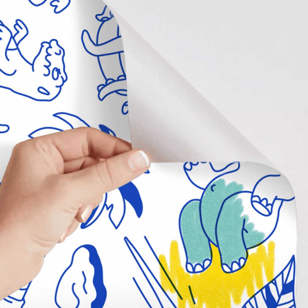 Démonstration de l’effet repositionnable du papier adhésif Stick-it Dinos avec motif colorié