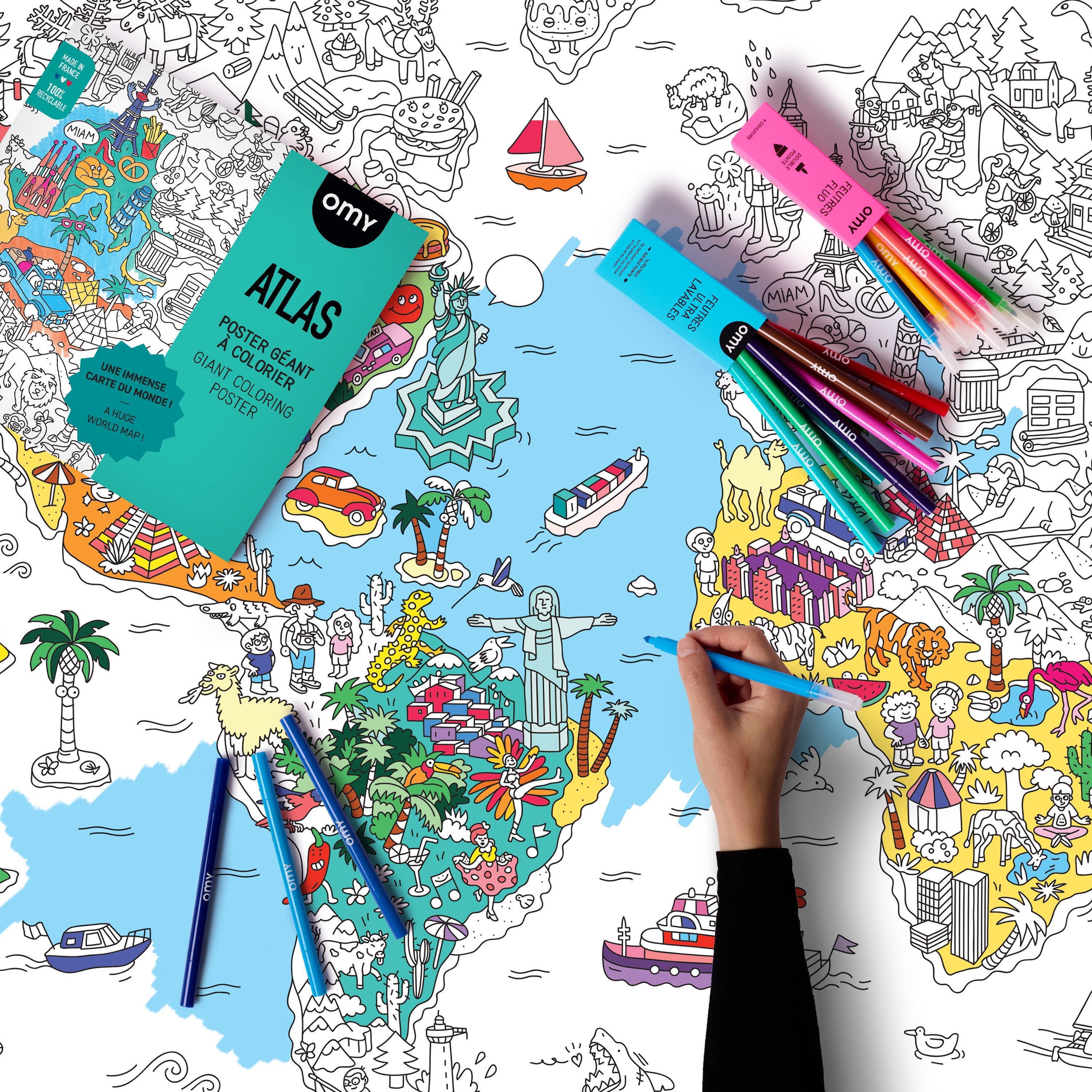 Feutres fluo OMY de la Basic Box avec crayons ouverts, parfaits pour colorier les posters géants de façon ludique