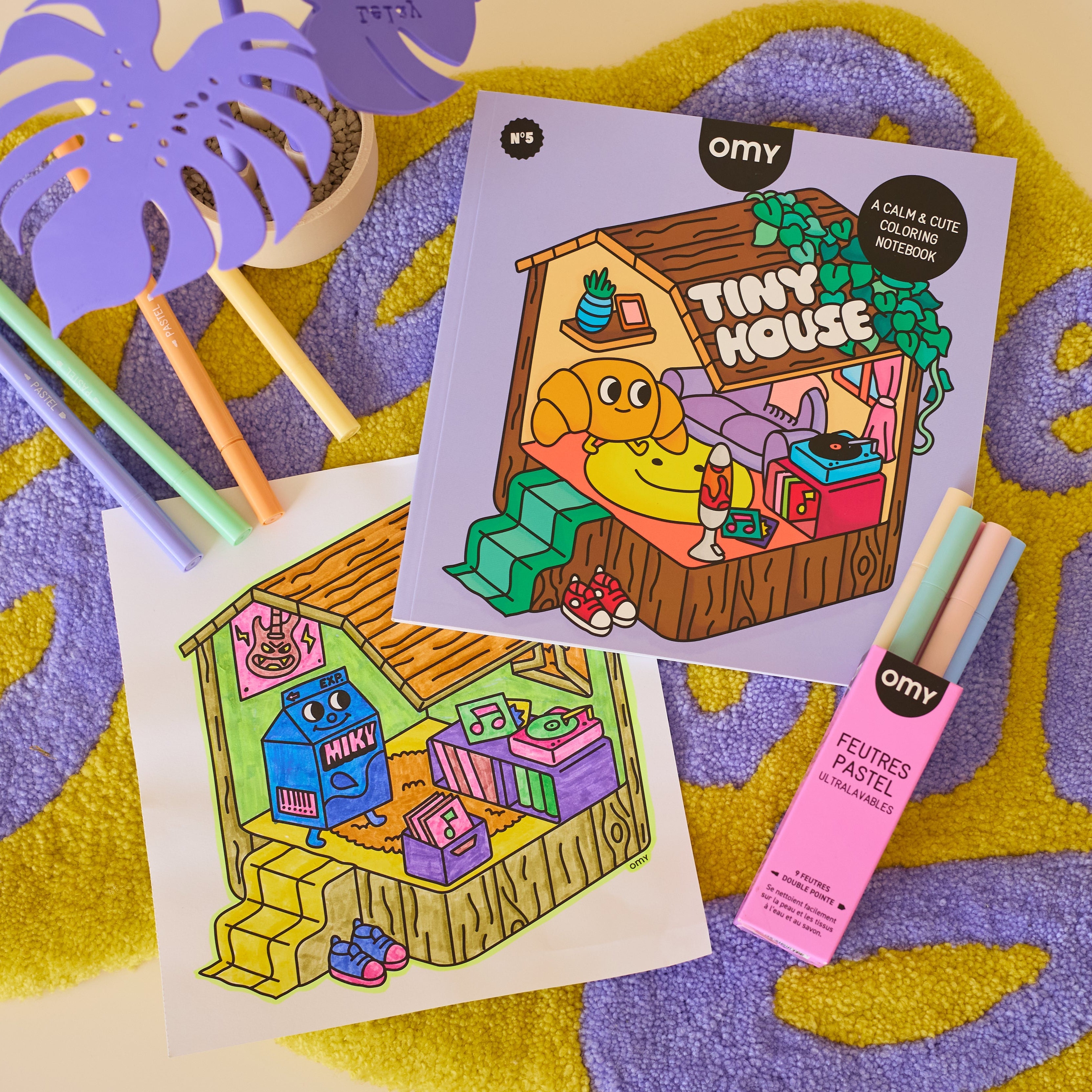 Cuaderno para colorear Tiny House OMY con rotuladores pastel e ilustración acogedora, un cuaderno creativo para un momento de relax