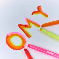 Colored strokes and patterns made with OMY gel pens.
