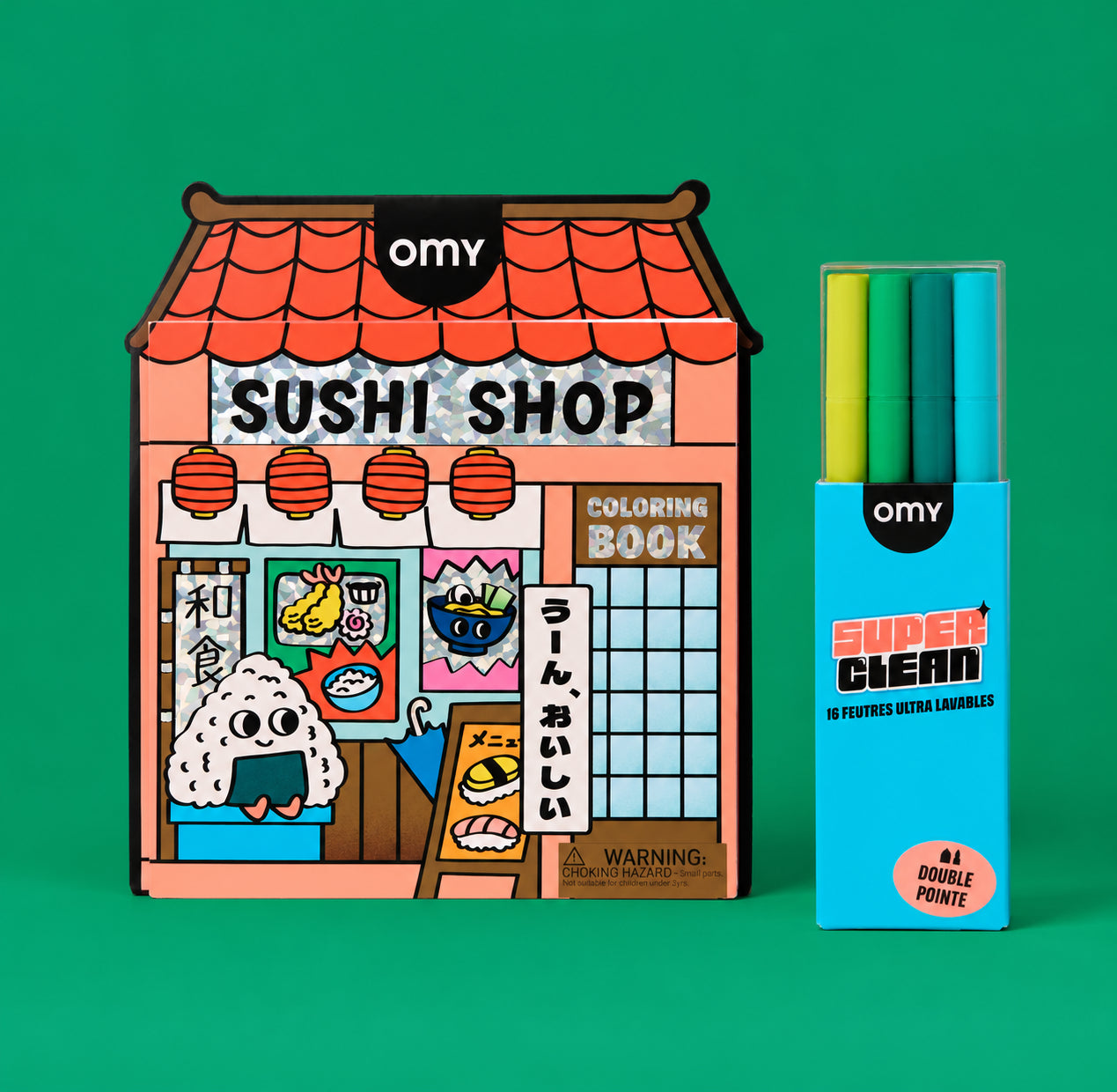 Coloring book Sushi Shop OMY en forme de restaurant japonais illustré et étui de feutres Super Clean bleu, sur fond vert