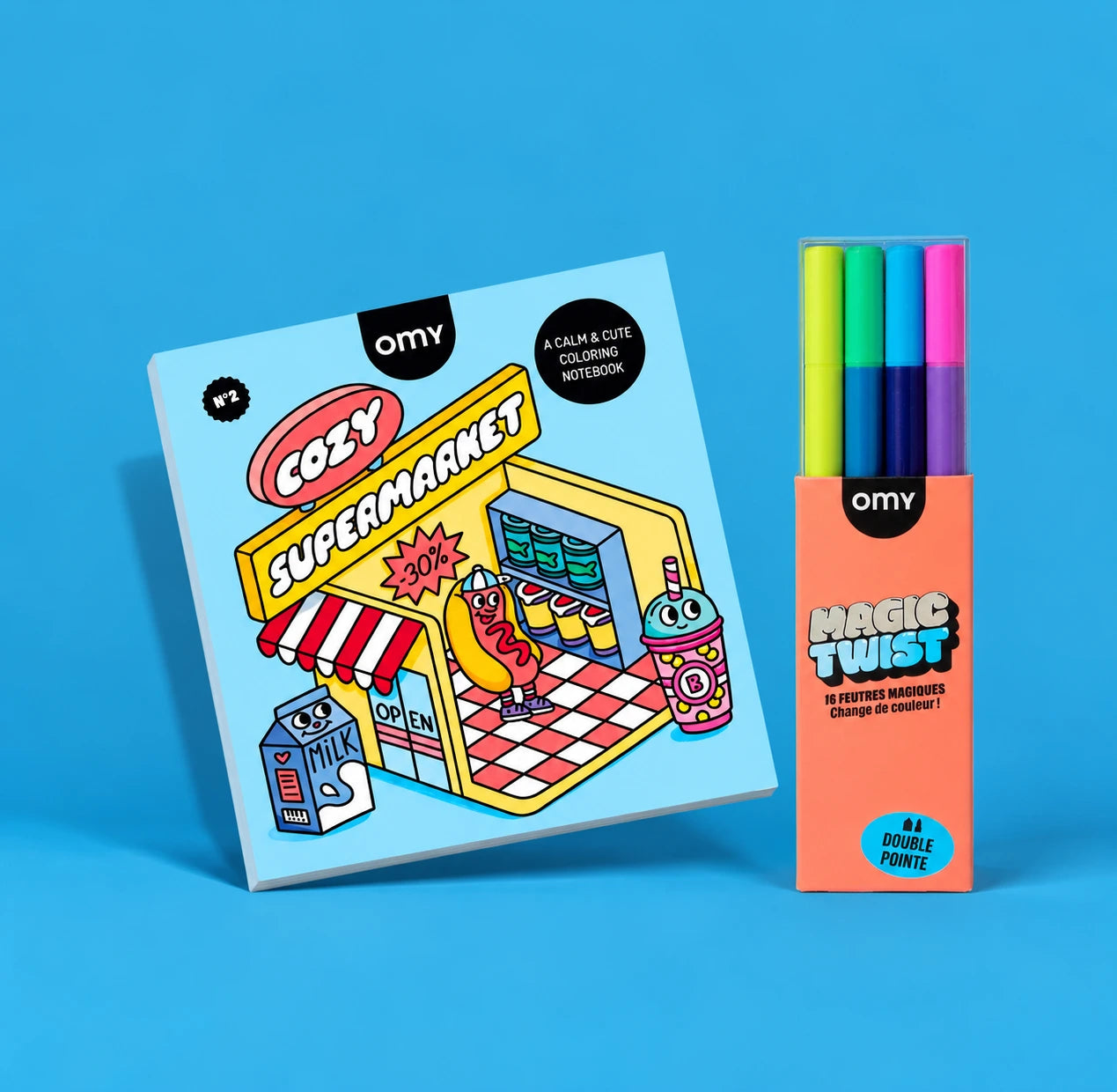Coffret coloriage OMY Cozy Supermarket : carnet de coloriage n°2 et feutres magiques Magic Twist double pointe