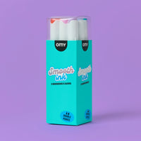 OMY alcohol-based markers displayed in their turquoise packaging.