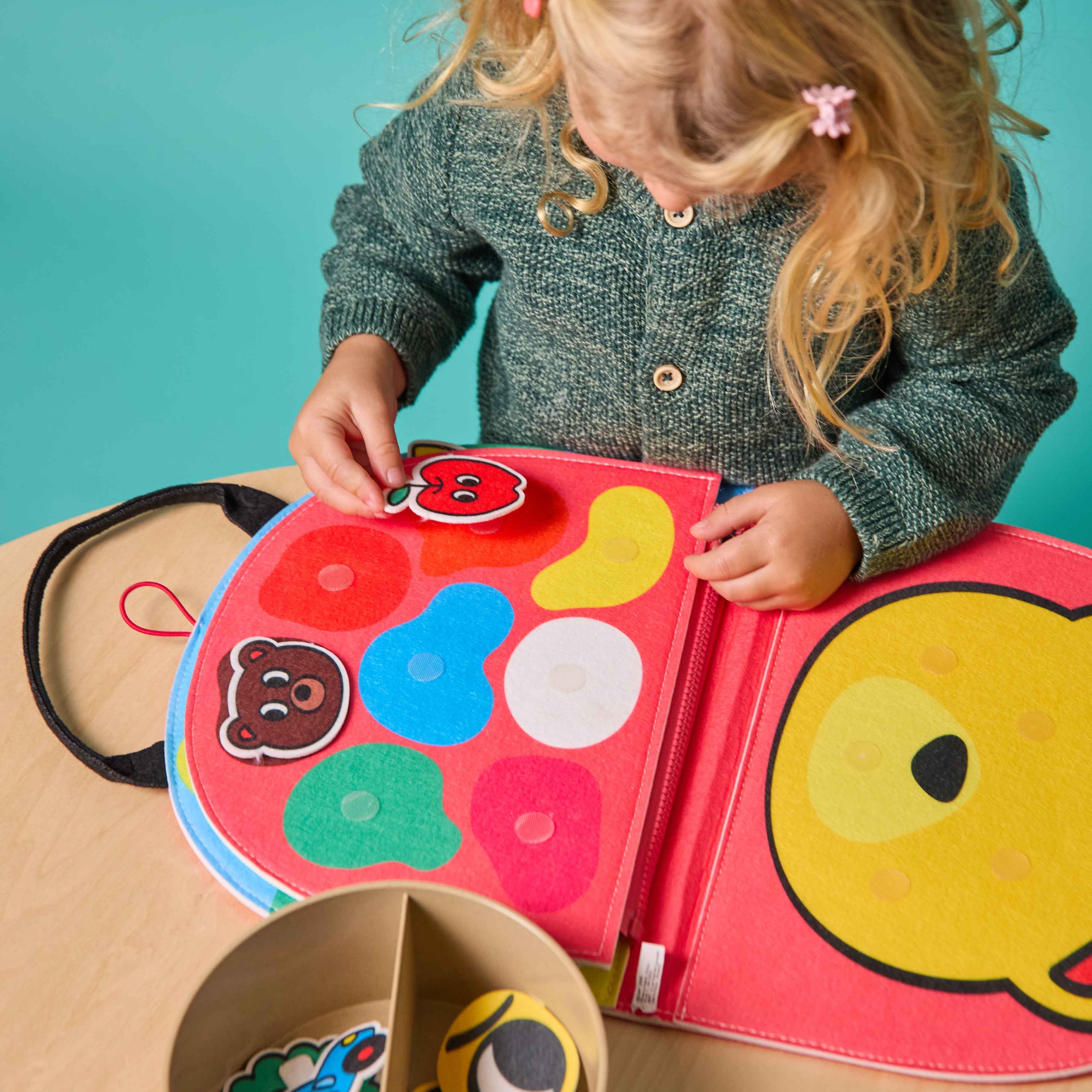Montessori Shapes & Colors OMY activity, child developing fine motor skills and coordination