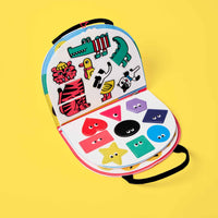 Montessori Shapes & Colors OMY kit open, colorful geometric shapes to handle