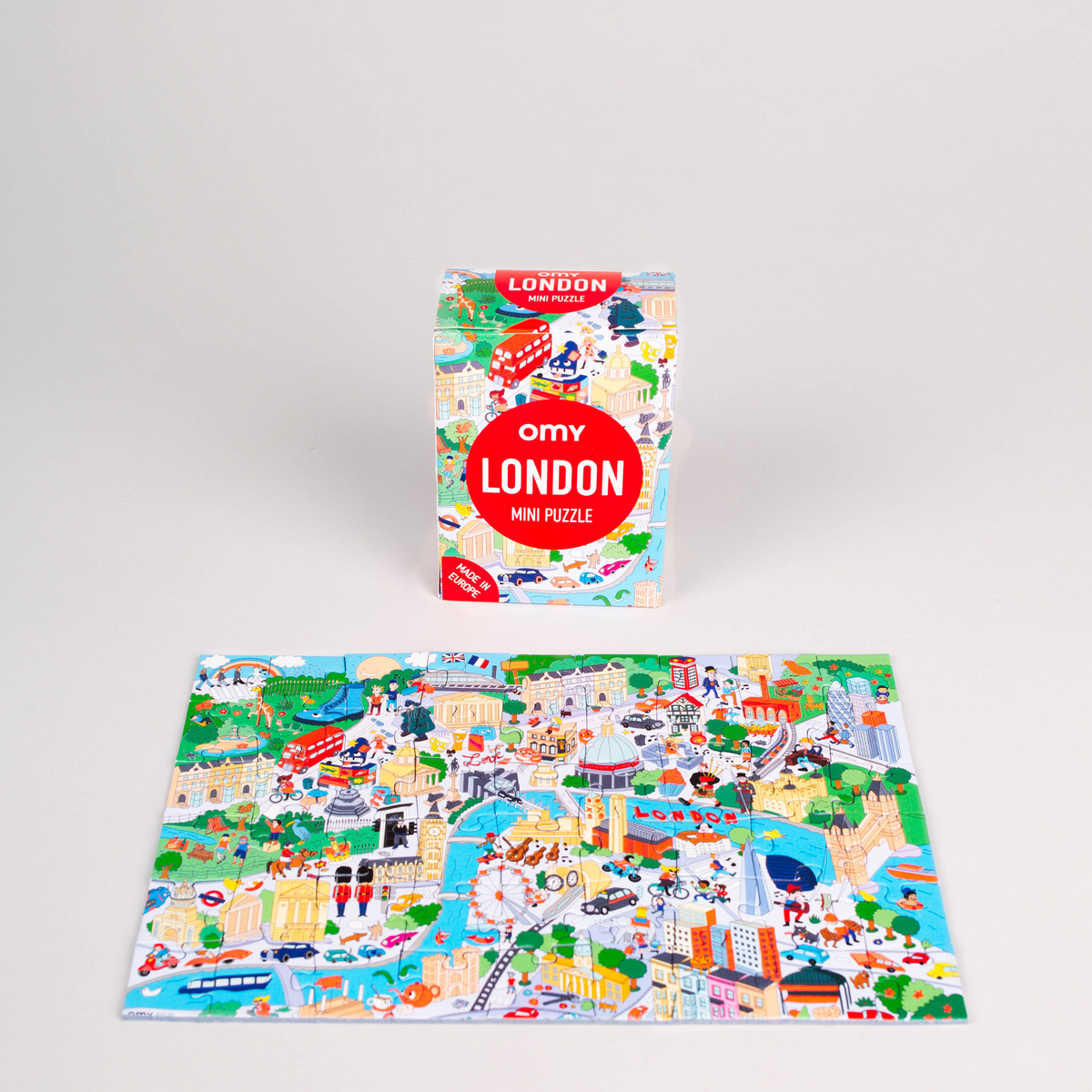 OMY Mini Puzzle London: doos en in elkaar gelegde puzzel met Londen, Big Ben, London Eye en rode bussen