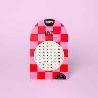 Pink and red checkered packaging of the 120 NYC OMY Body Art nail stickers, with New York motifs, on a pink background.