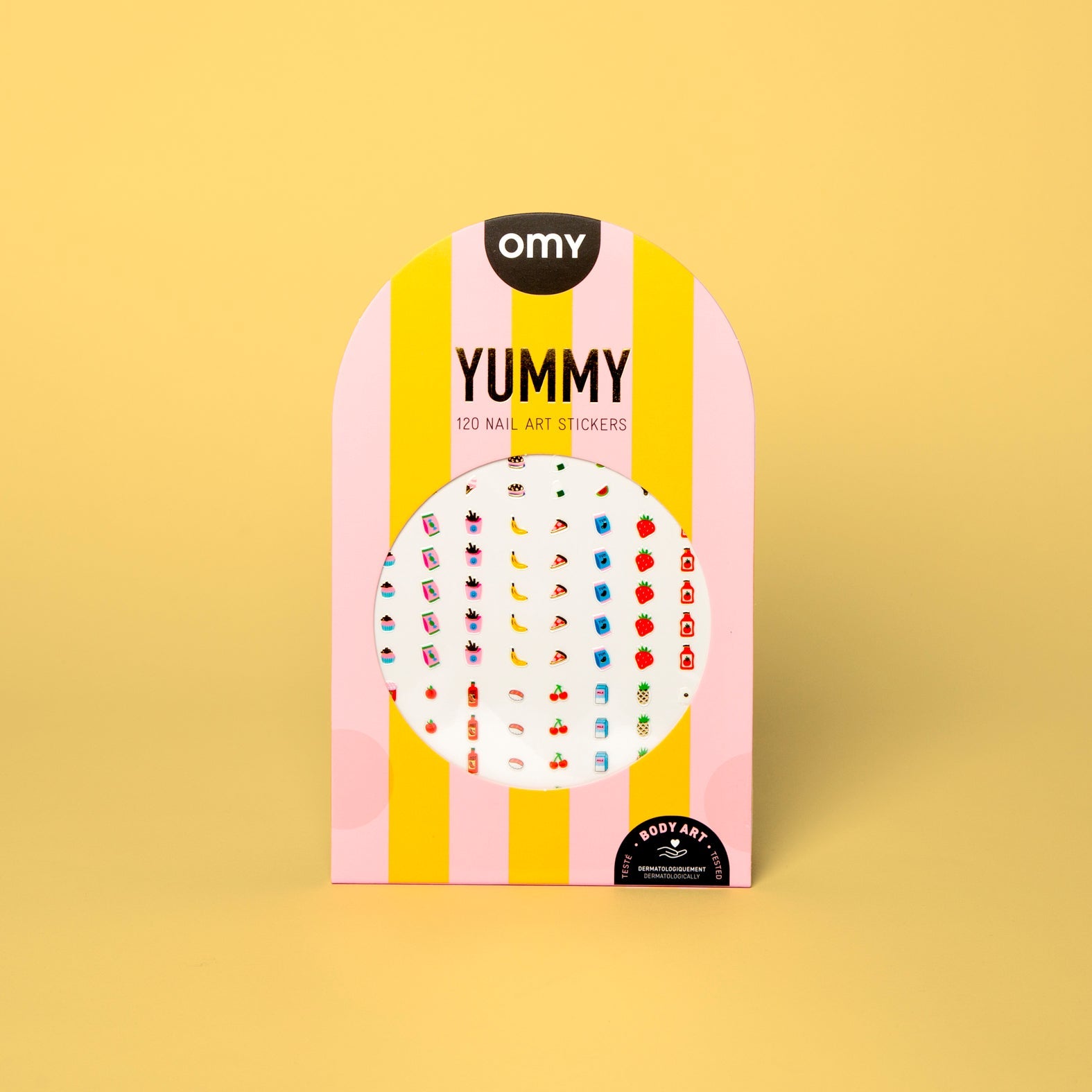 Emballage rayé rose et jaune des 120 stickers pour ongles Yummy OMY Body Art, avec motifs gourmands, sur fond jaune