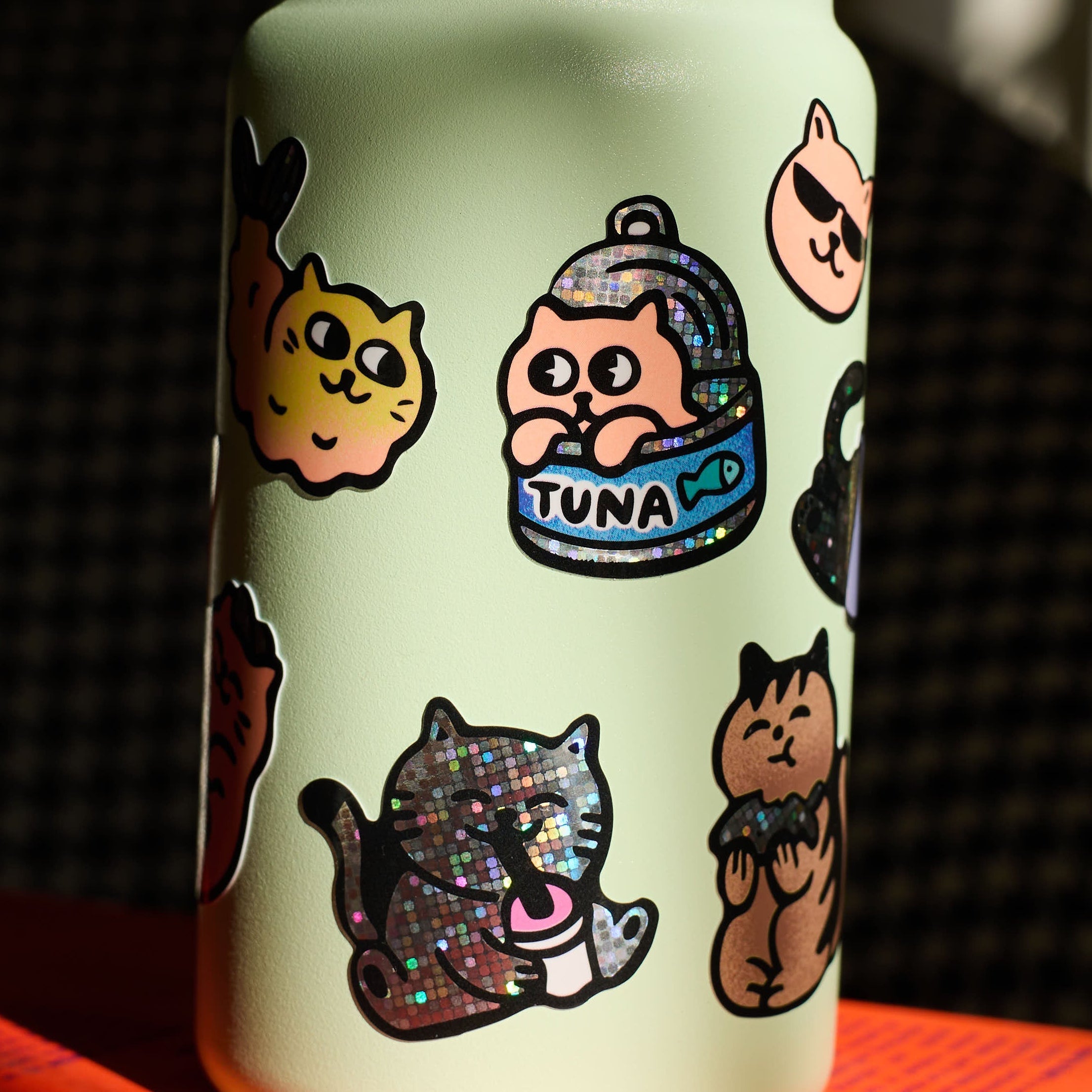 Close-up of OMY holographic kawaii cat stickers, glossy vinyl stickers from the Fabulous Stickers Kitty collection.