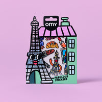 Packaging Fabulous Stickers Paris OMY avec fenêtre transparente laissant apparaître les stickers holographiques sur fond rose.
