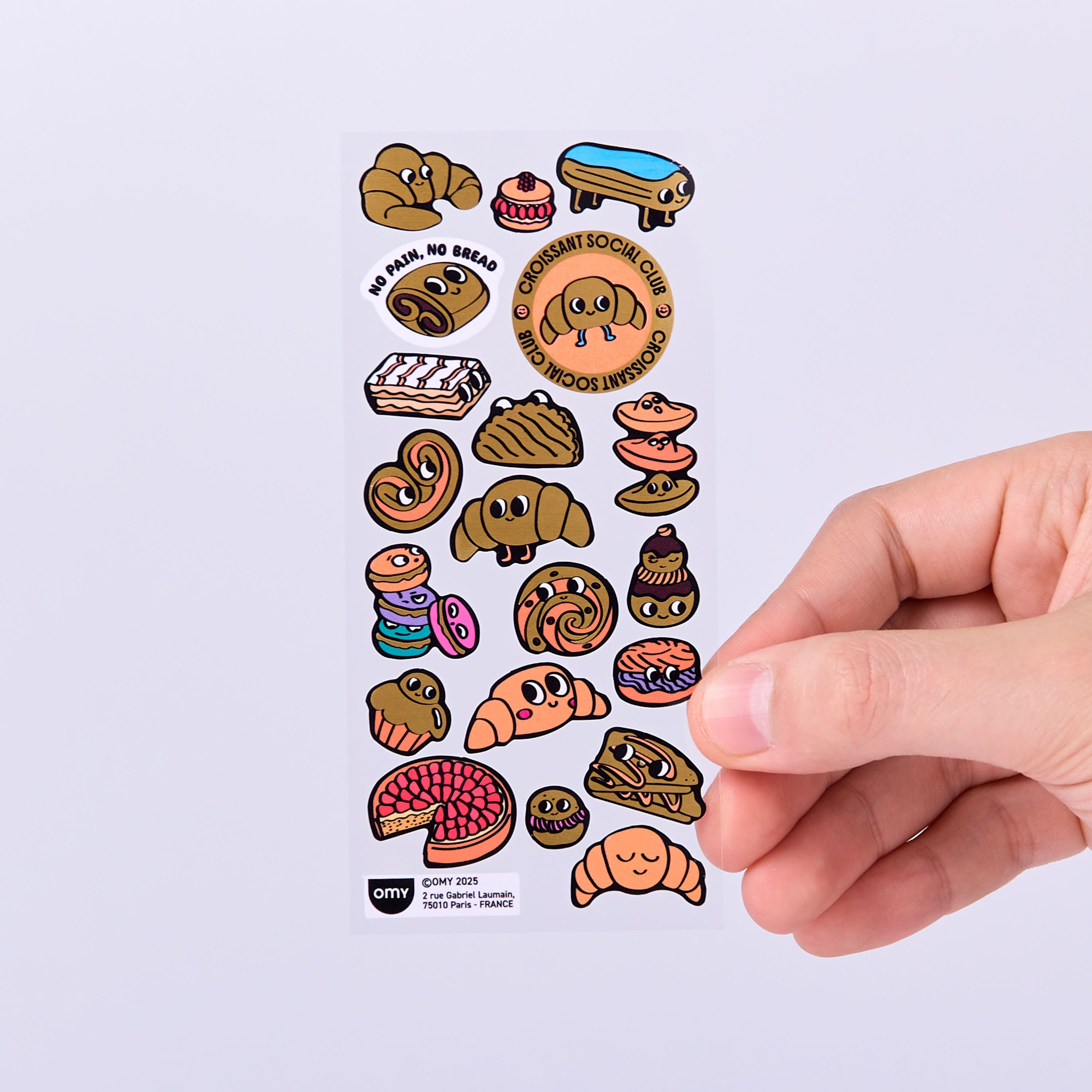 Planche de stickers Croissant OMY avec croissants, donuts, brioches et pâtisseries illustrées, vue de face.