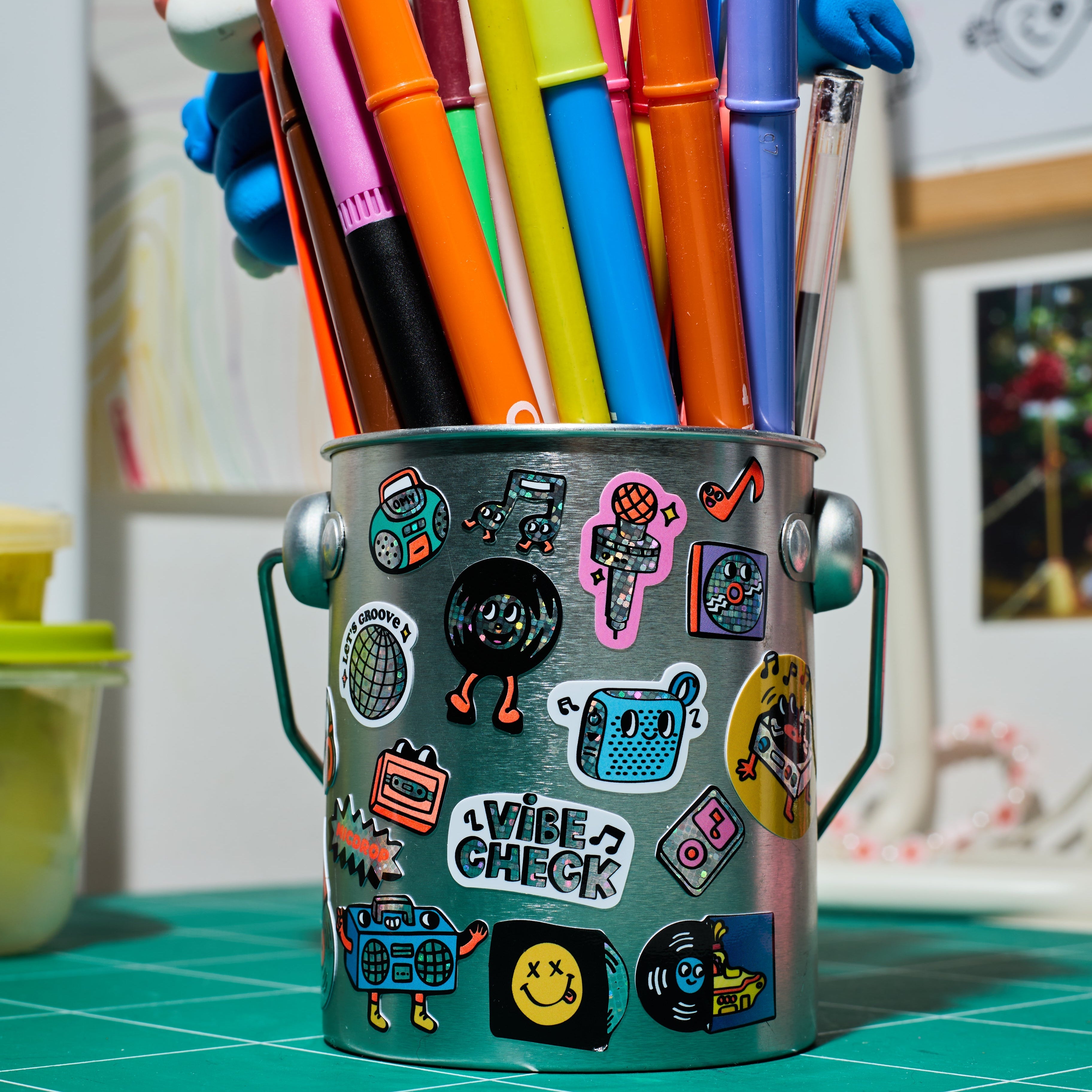 Fabulous Stickers OMY music stickers stuck on a pencil pot with colored markers, creative waterproof vinyl decor
