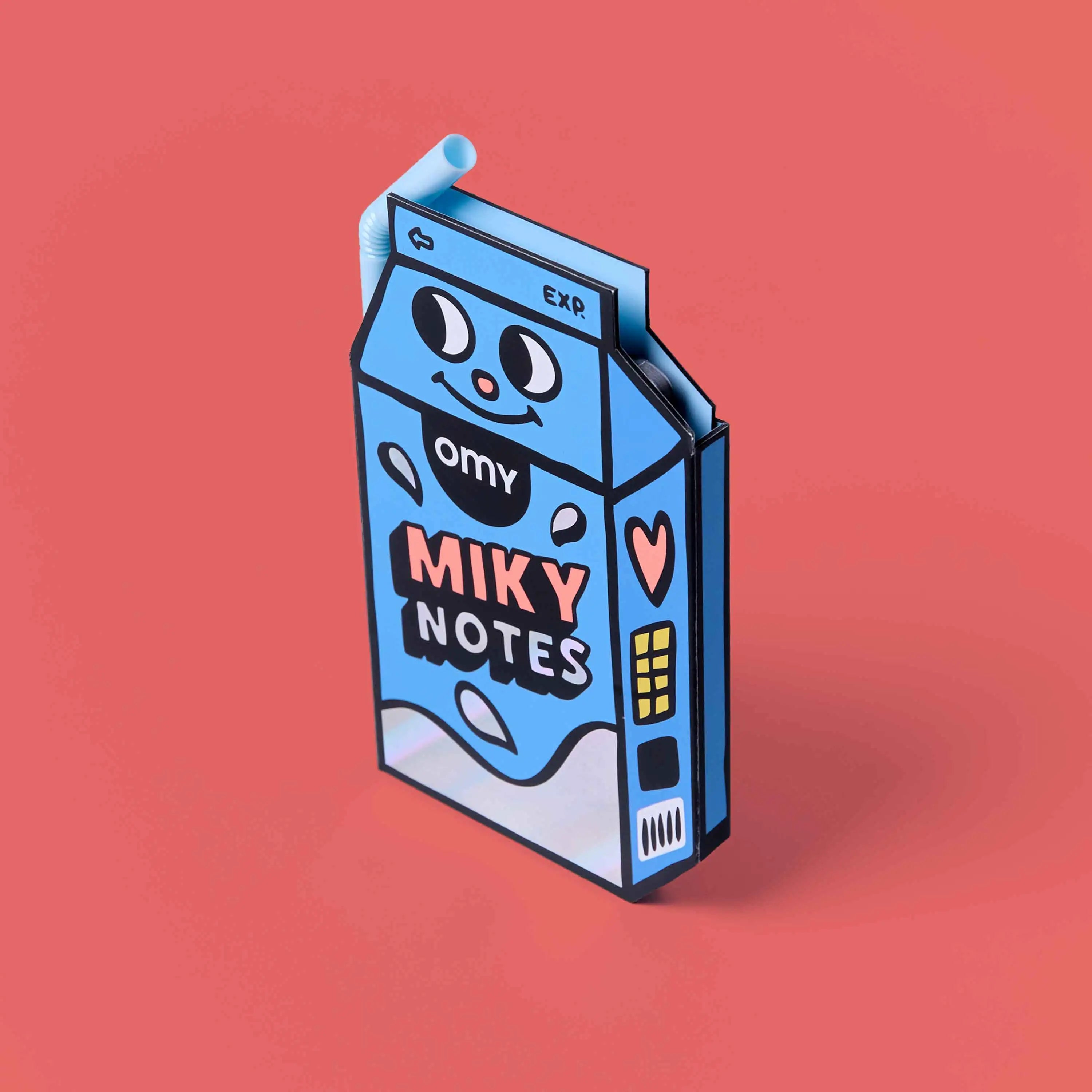 Sticky Notes Miky OMY – Vue de profil du bloc-notes en forme de brique de lait bleue avec paille-stylo et personnage souriant