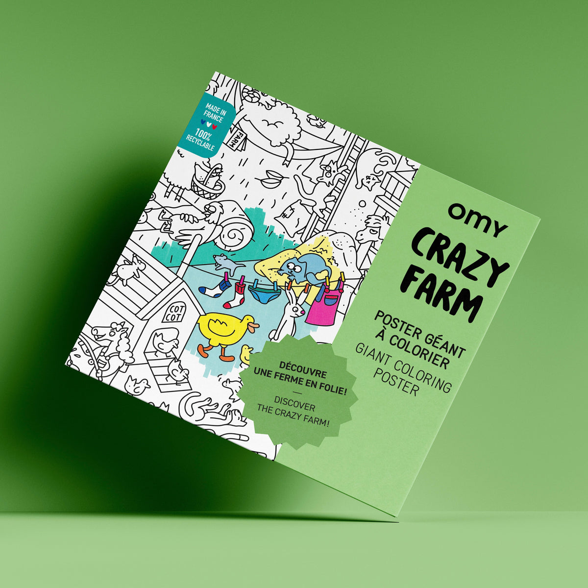 Packaging du poster géant à colorier Crazy Farm OMY sur fond vert, avec des illustrations d’animaux rigolos de la ferme.