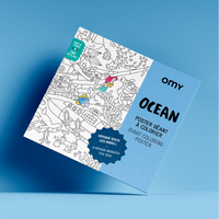 Packaging of the giant Ocean coloring poster by OMY on a navy blue background